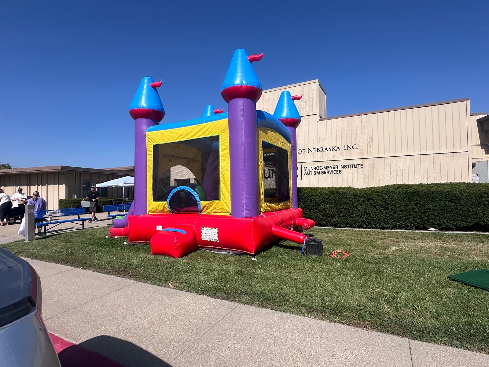 Midwest Mercantile setting up a bounce house rental